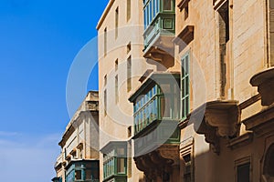 Historical old colorful balconies in Valletta, Malta photo