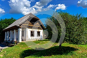 Historical old hungarian house with straw roof in museum village