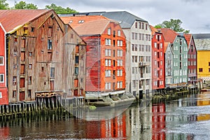 Historical Old Timber Buildings and the river Nidelva in Trondheim. photo