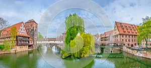 Historical old town with view of Weinstadel, bridge and Henkerturm tower in Nurnberg, Germany