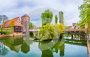 Historical old town with view of Weinstadel, bridge and Henkerturm tower in Nurnberg, Germany