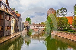 Historical old town with view of Weinstadel, bridge and Henkerturm tower in Nurnberg, Germany