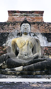 Historical Park Wat Mahathat temple bhudda statue vertical