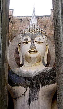 Historical Park Wat Sri chum temple bhudda statue closeup