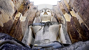 Historical Park Wat Sri chum temple bhudda statue worm eye view