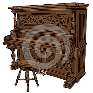 The historical pianino with a chair