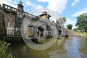 Historical river lock with open gate