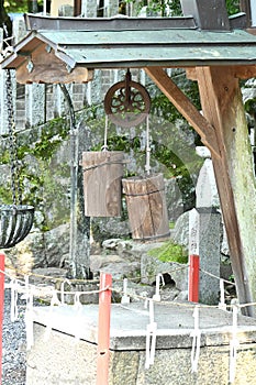 Historical scenery of Japan travel. Japanese old water well.