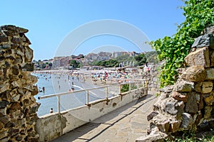 Sozopol central beach view through the historical southern walls over the BLack sea cove in Sozopol, Bulgaria, Europe