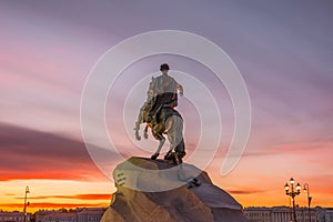 Historical Statue of the monument to Peter 1, Bronze Horseman in Saint-Petersburg at sunset evening sky.