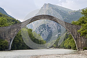 Historical stone bridge of Plaka in Greece