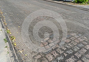 Historical Stone Pavement under Asphalt, Eternal Ancient Roads, Millennial Quality