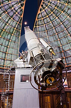 Historical telescope pointed at the sky