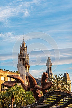 Historical towers and Gambrinus Lobster Statue in the city Barcelona, Spain
