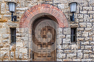 Historical wooden door with arch dated to 18th century in Bruchsal, Germany