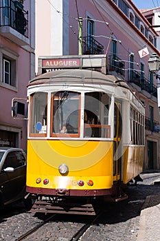 Historical yellow tram in Lisbon photo