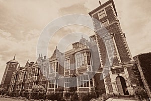 History of Architecture. Vintage toned typical historic English manor house