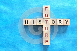 History and future relationship and interconnection concept. Crossword puzzle flat lay