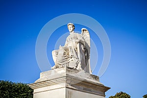 History statue near the Triumphal Arch of the Carrousel, Paris, France