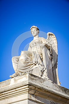 History statue near the Triumphal Arch of the Carrousel, Paris, France