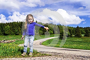 Hitch-hiking by cute little girl