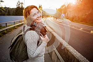 Hitch-hiking girl on a road