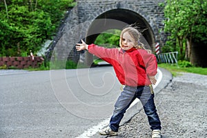 Hitch-hiking by little girl