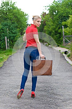 Hitchhiker with suitcase