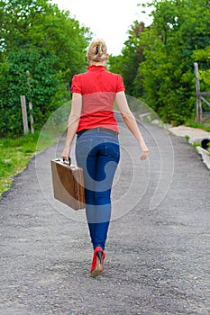 Hitchhiker with suitcase