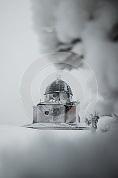 Hitoric chapel on Mount Radhost in Pustevny in Beskydy mountains in the east of the Czech Republic. Minimalism. The chapel rises