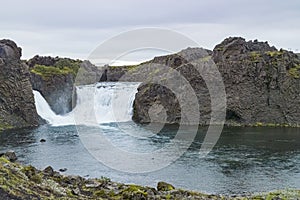 Helper waterfall HjÃÂ¡lparfoss in a FossÃÂ¡ in Iceland photo