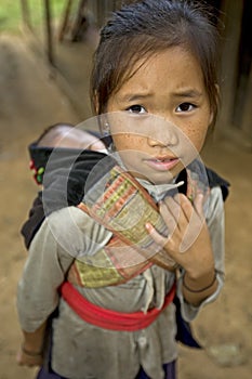 Hmong girl with brother, Laos