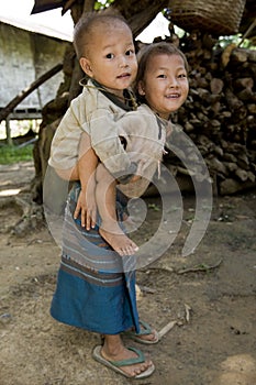 Hmong girl with brother, Laos
