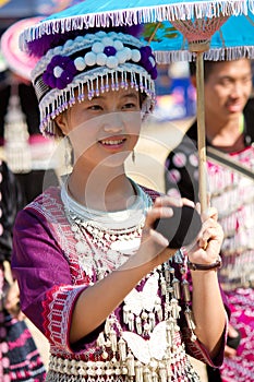 Hmong hill tribe woman play a ball.