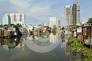 Ho Chi Minh City slums by river, Saigon, Vietnam