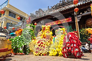 Ho Chi Minh, Vietnam - February 18, 2015 : Lion dancing to celebrate Lunar New Year at Thien Hau Pagoda