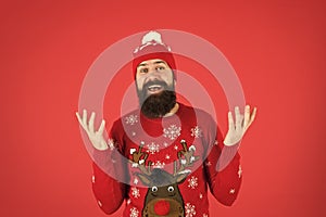 Ho ho ho. brutal hipster in knitted hat. wear christmas mood. knitwear male fashion. funny looking man. new year party