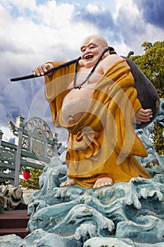 Ho Tai Laughing Buddha Statue at Haw Par Villa