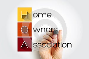 HOA - Homeowners Association acronym with marker, business concept background