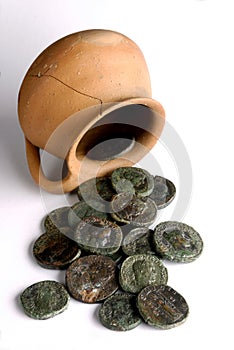 A hoard of roman coins isolated on white background