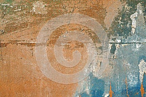 Hoarse,scratched and peeled surface with blue and yellowish-bro photo