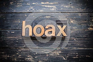 Hoax Concept Vintage Wooden Letterpress Type Word photo