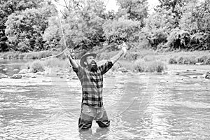 hobby for reel men. fisherman show fishing technique use rod. mature man fly fishing. man catching fish. bearded fisher