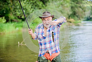 Hobby sport activity. Fish farming pisciculture raising fish commercially. Pensioner leisure. Man senior bearded