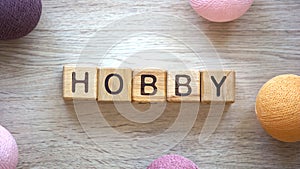 Hobby word made of wooden cubes, creativity, way to realize your potential photo