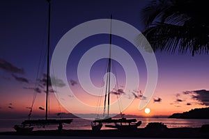 Hobie cat or catamaran on the beach at beautiful sunrise early morning