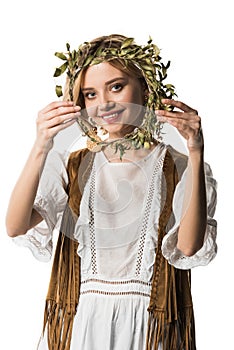 Hobo girl with wreath smiling at camera isolated on white