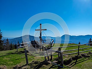 Hochanger - Scenic view of summit cross of mountain peak Hochanger in Bruck an der Mur, Lavanttal Alps, Styria, Austria