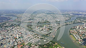 HOCHIMINH, VIETNAM - APRIL, 2020: Aerial panorama view of the cityscape and Saigon river of Hochiminh.