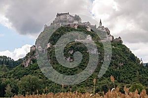 Hochosterwitz Castle on a high wooded hill in Carinthia, Austria. View of the main castle building, fortifications, protective wal